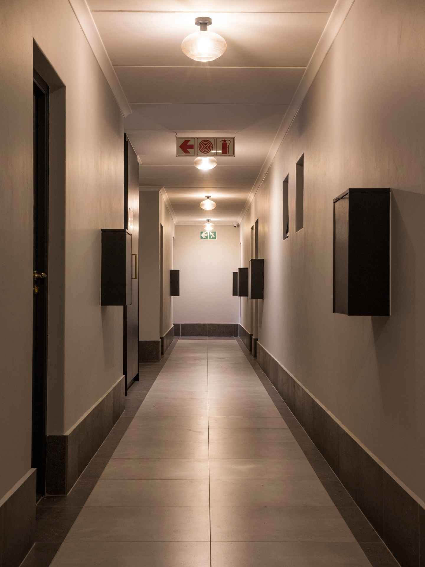 Hotel looking passages with mailboxes